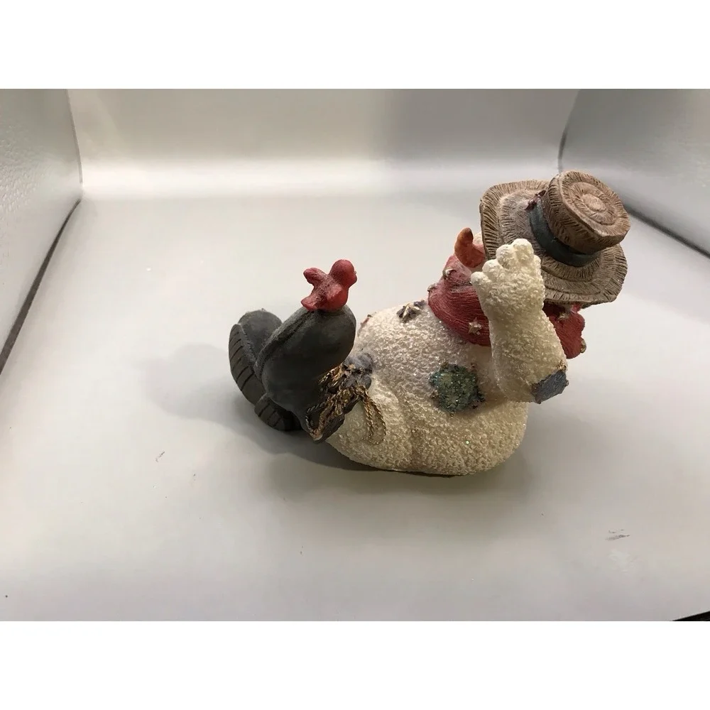 Resin Snowman Kicked‎ Back With A Bird On His Foot